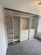 Taupe grey wardrobe with space for shoes, dresses, shirts or blouses and much more, fitted in Normanby